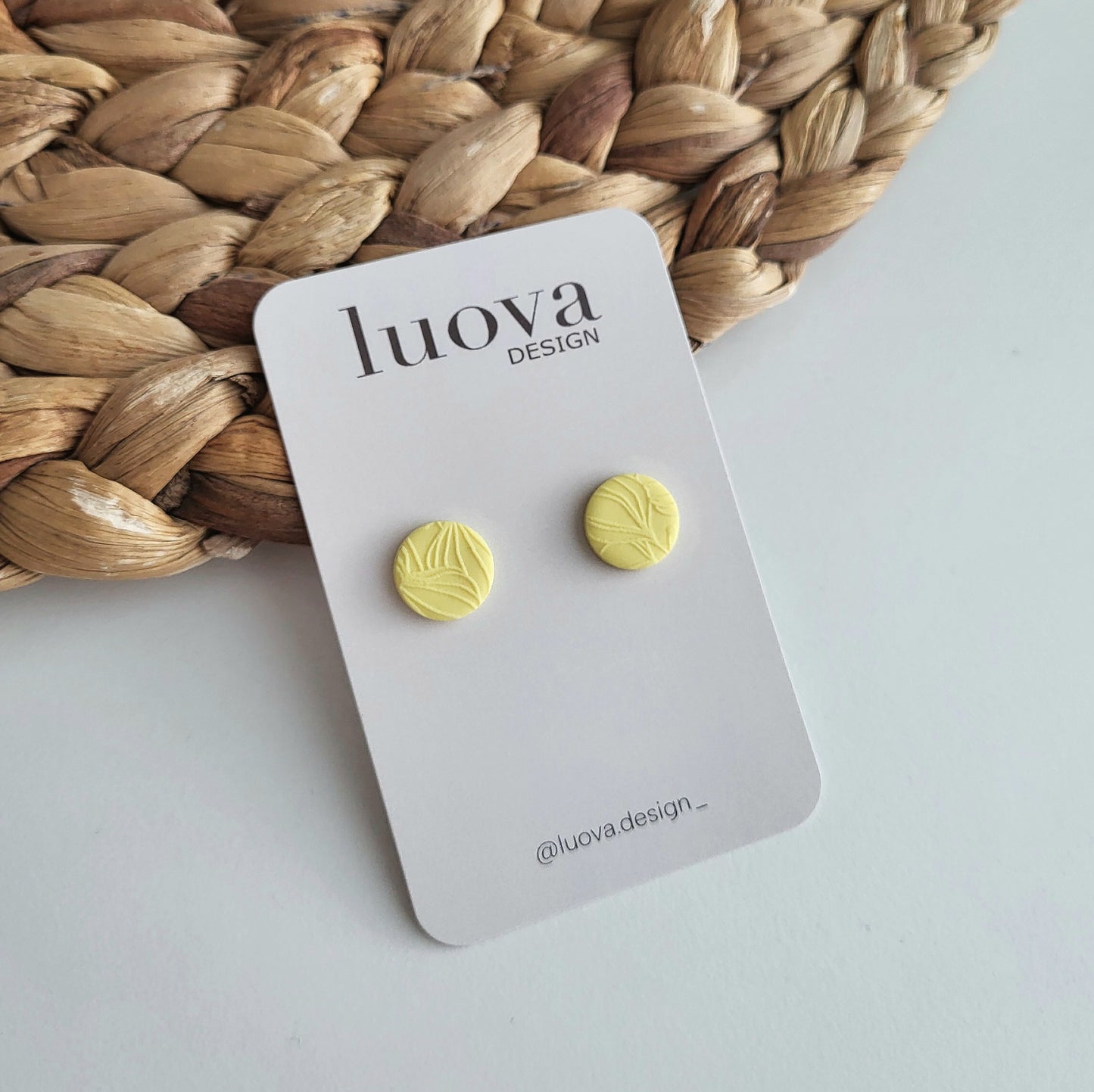 Nappikorvakorut kohokuviolla 12mm (useita värejä)